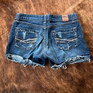 BKE Star cutoff shorts. Size 27. Raw edge. Distressed